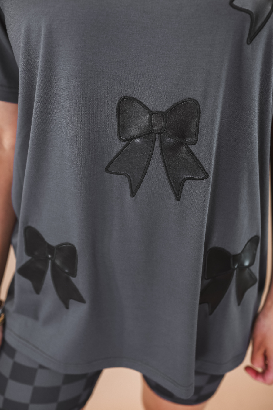 PREORDER-Faux Leather Bow Oversized Tee - ETA to me is 6/30 or before.
