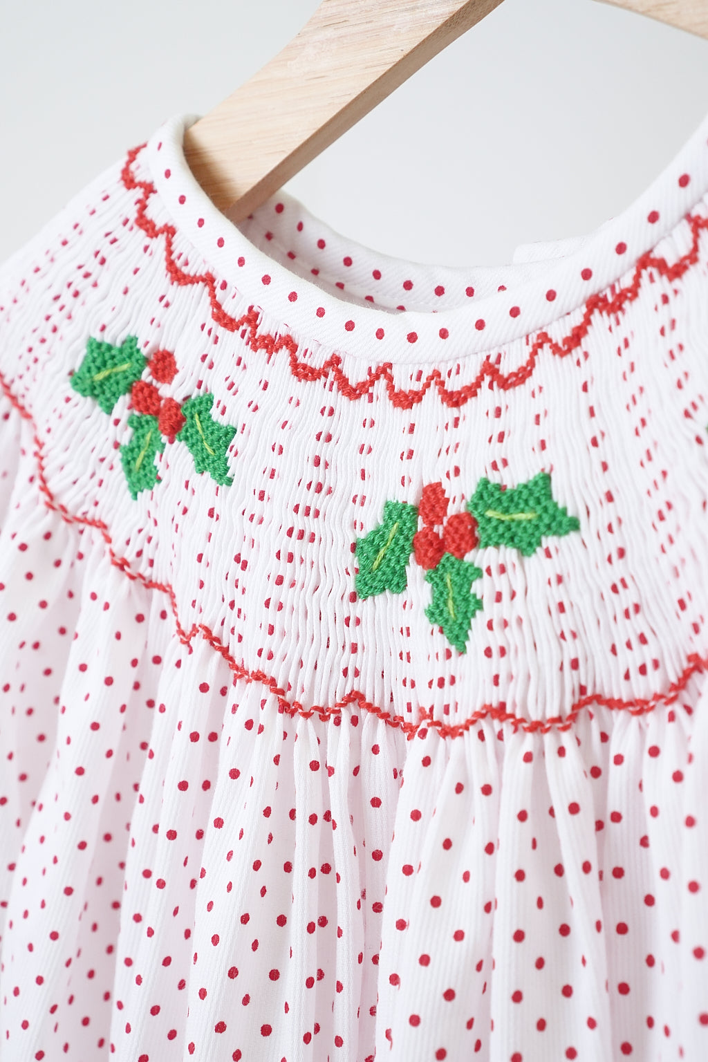 Pink christmas bishop hand smocked dot dress