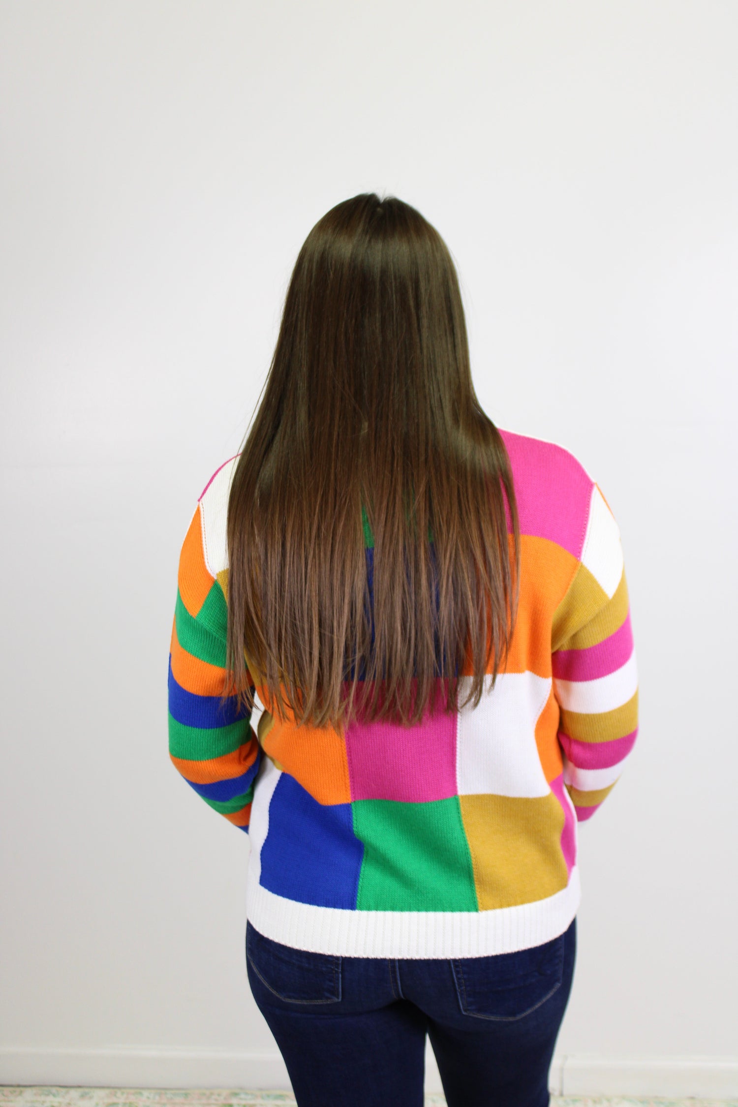 Rainbow Checkered Sweater December.